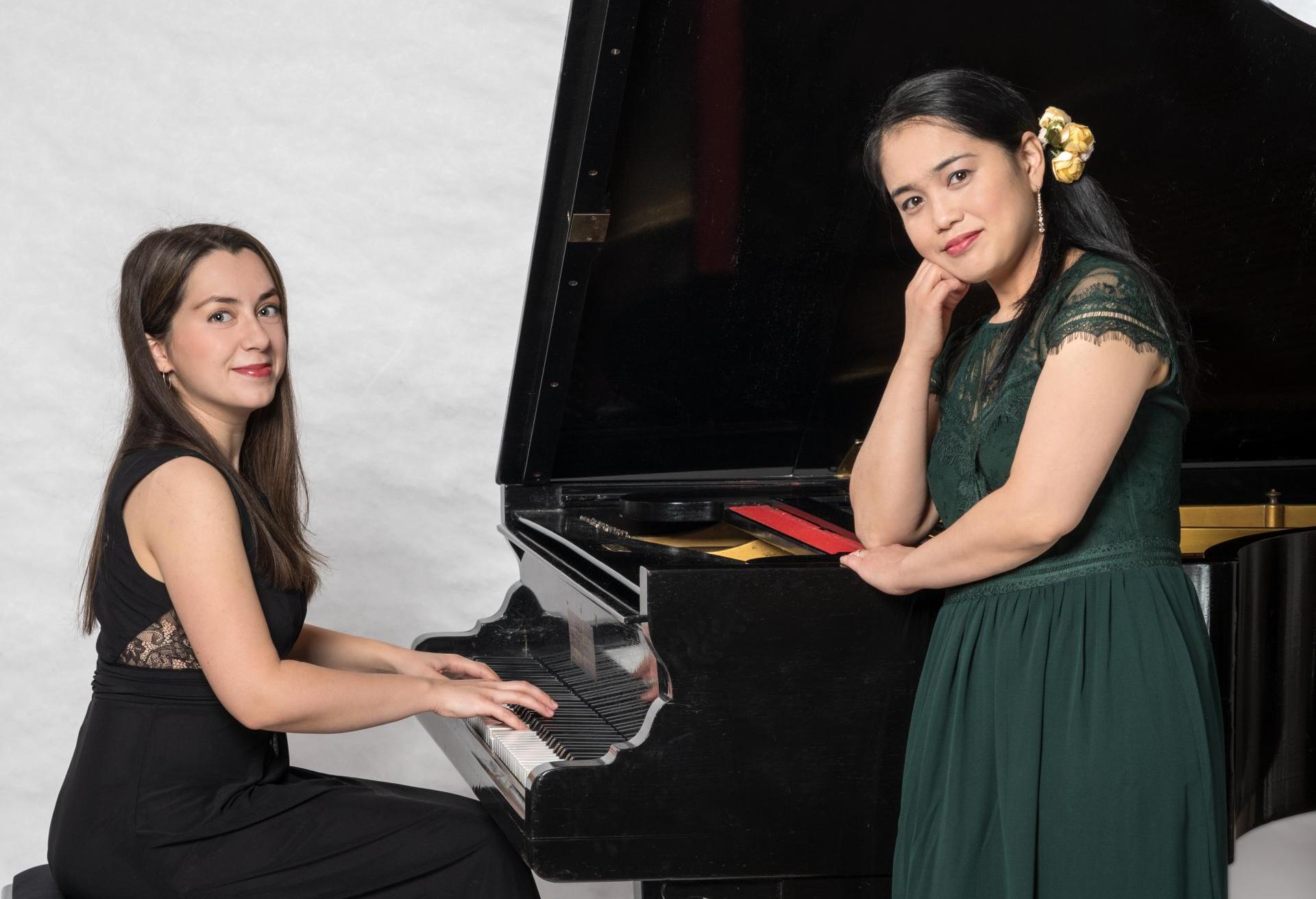 Two young musicians at the grand piano
