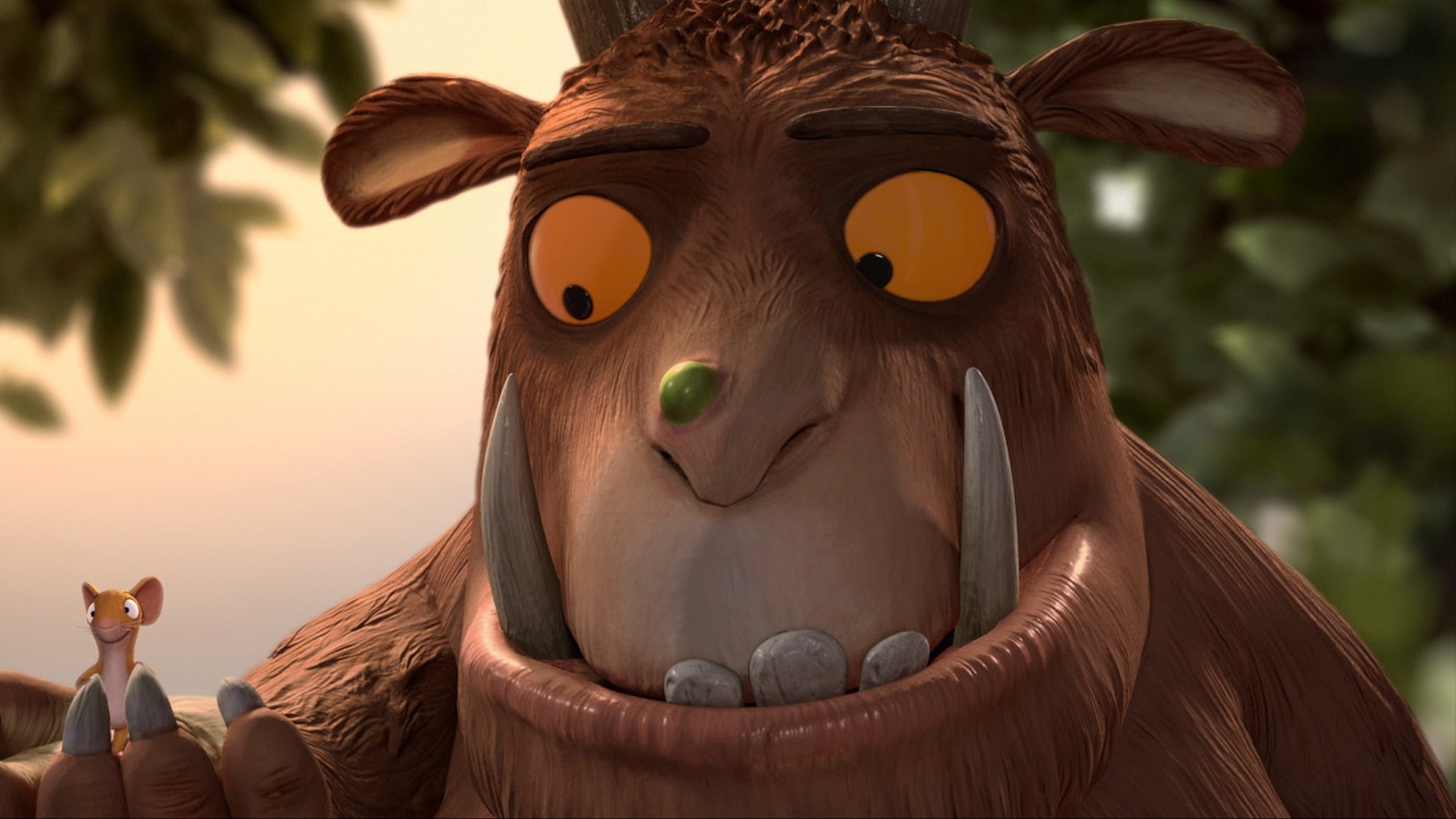 Animation von einem großen braunen Tier mit großen Zähnen und gelben Augen, das eine Maus in der Pranke hält.
