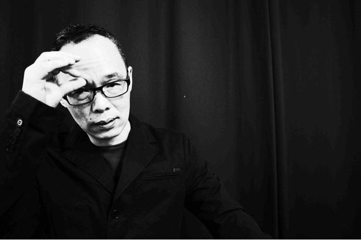 Black and white portrait of the composer Jing Peng.