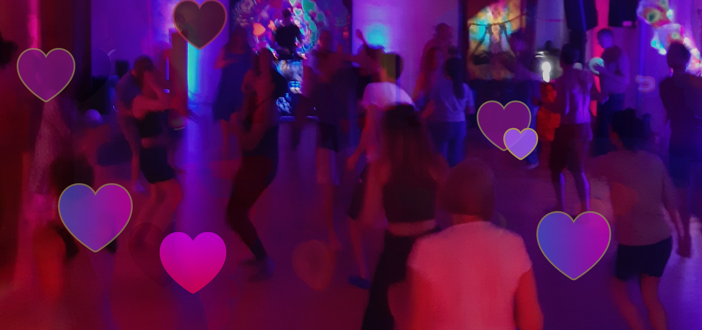 A dance floor with dancing people, overlaid with hearts.