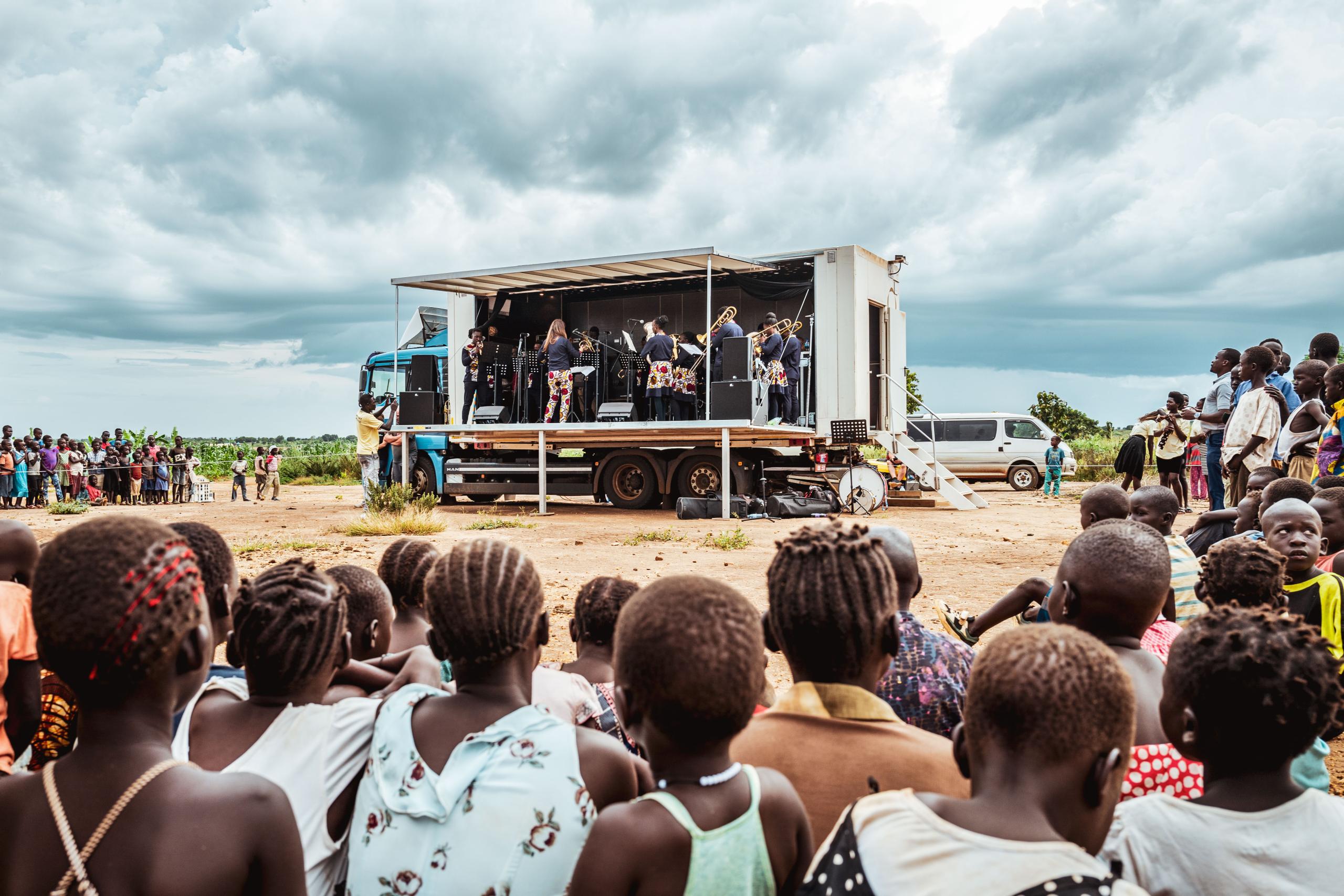 Musicians play a concert in the truck on a fold-out stage